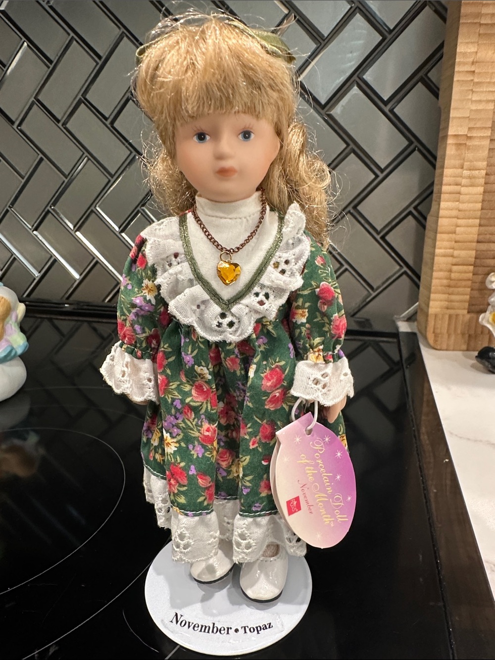 Porcelain Collectible Doll in Green Floral Dress - November Topaz
